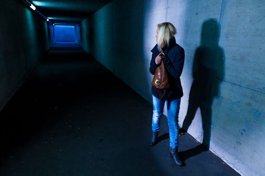 16392102 - a young woman in an underpass