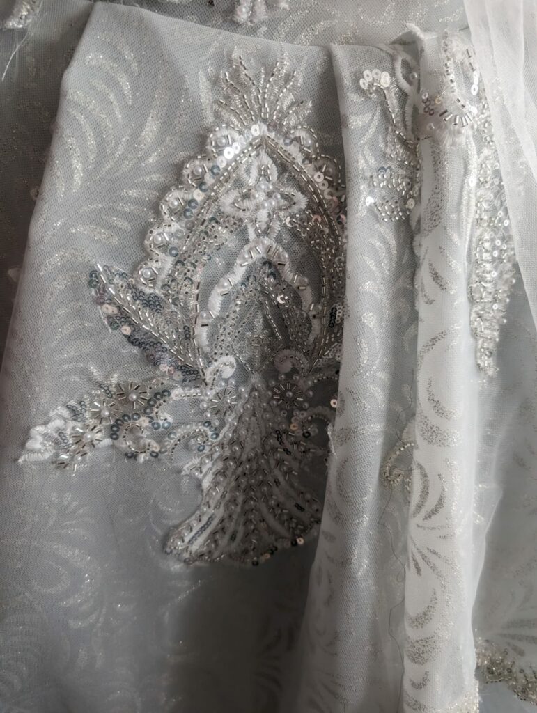 retouche robe de mariée grande taille sur-mesure